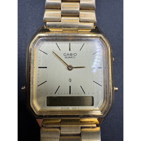 Vintage Casio AQ-222 Gold Tone Unisex Analog & Digital 30.6mm Watch - Picture 1 of 10